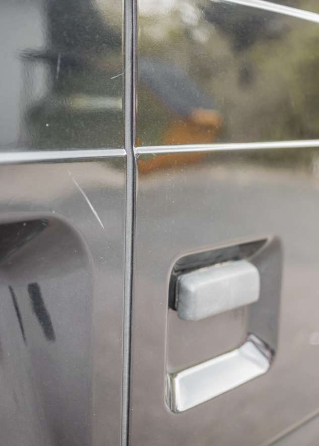 Close up shot of scratches on paintwork on Ford Transit van 