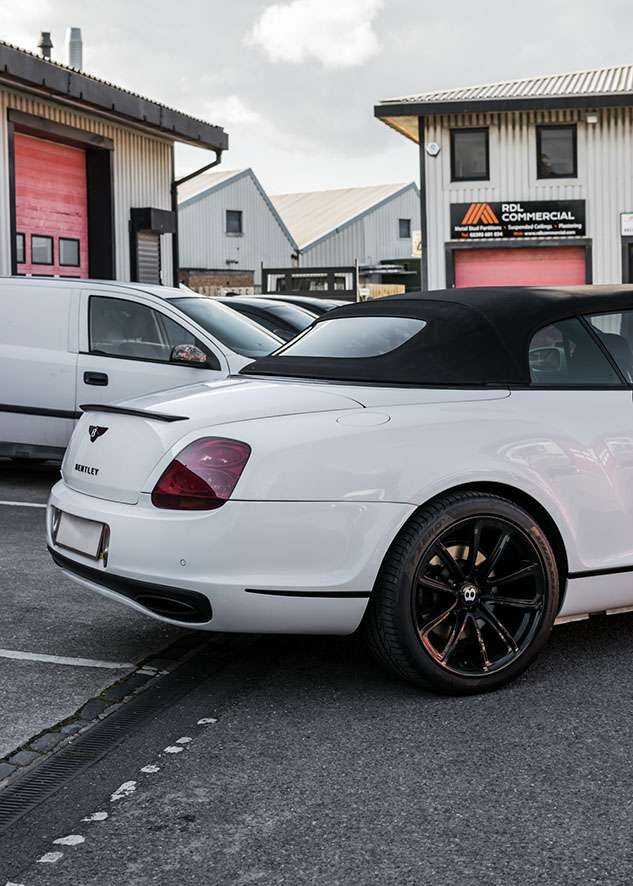 Bentley Continental GT car with tinted windows from side