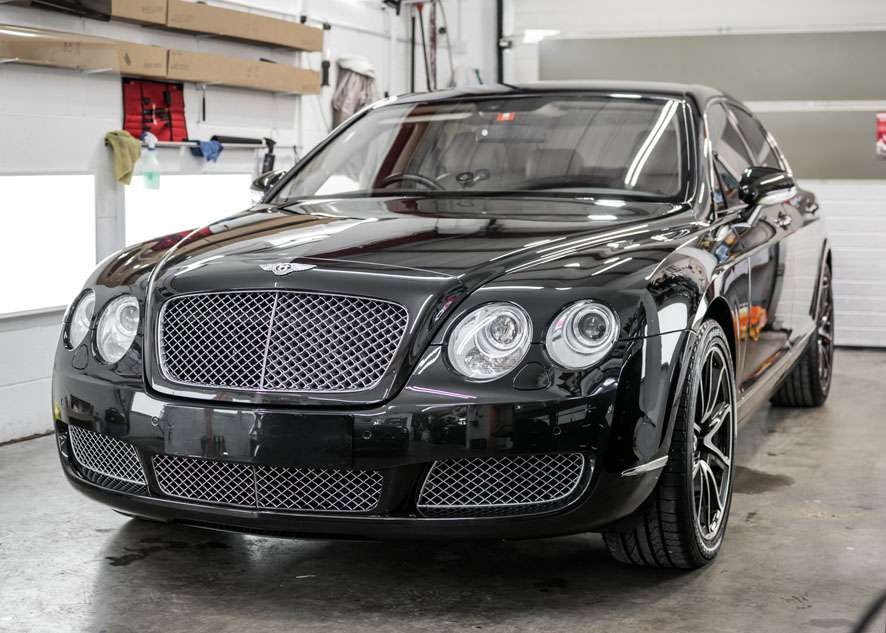 Shiny Bentley Flying Spur car after paint correction, paint correction, Paintwork Enhancement and headlight restoration