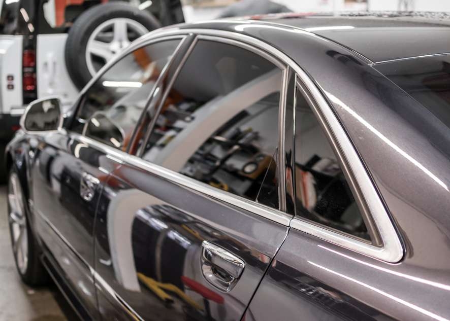 Audi s8 car with tinted windows from side close shot