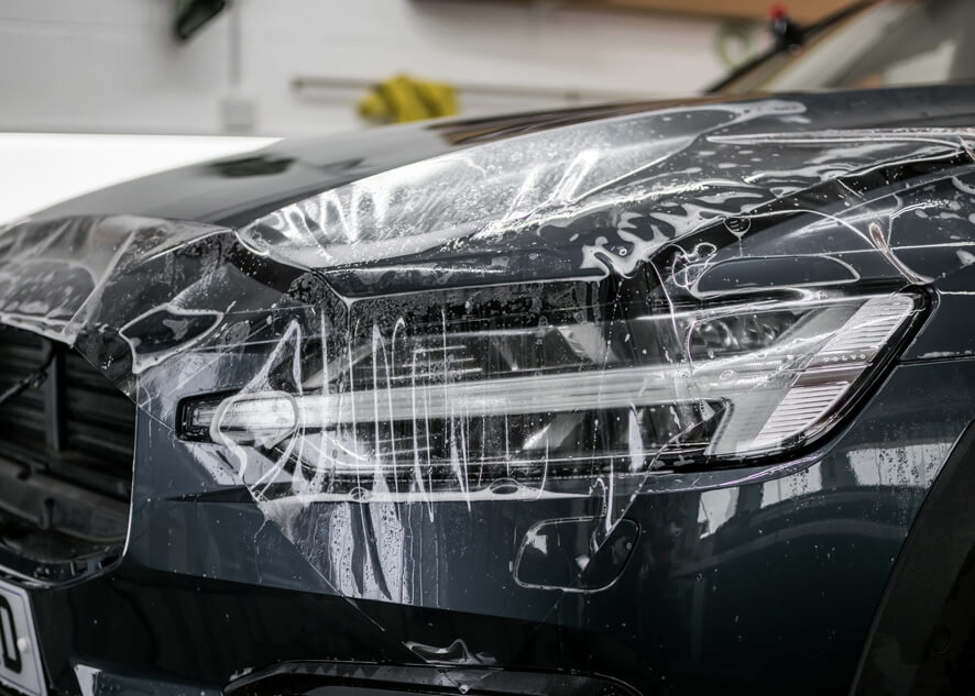 Headlights covered with paint protection film