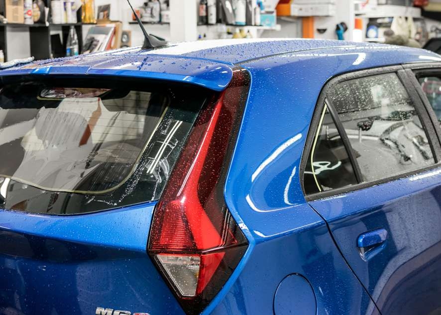 Blue MG3 car untinted rear window before window tinting