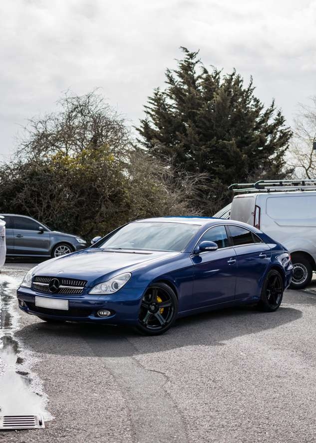 Blue Mercedes CLS after vinyl car wrapping from grey colour